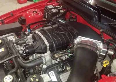 super charger in red car hero image